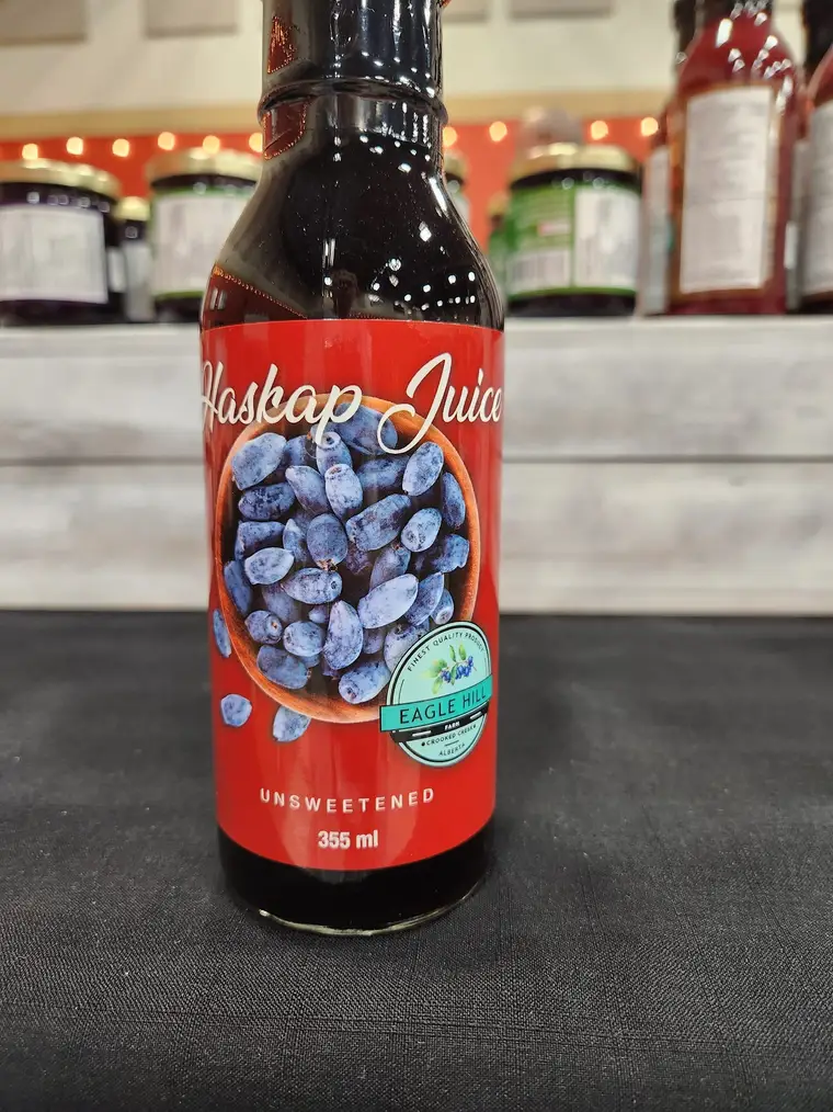 A bottle of Eagle Hill Farm unsweetened haskap juice